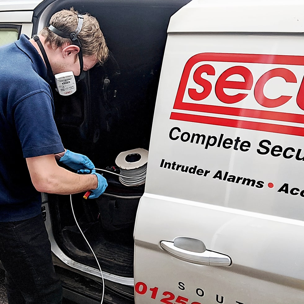 Securifix Home Burglar Alarm Installer Wearing PPE Protection